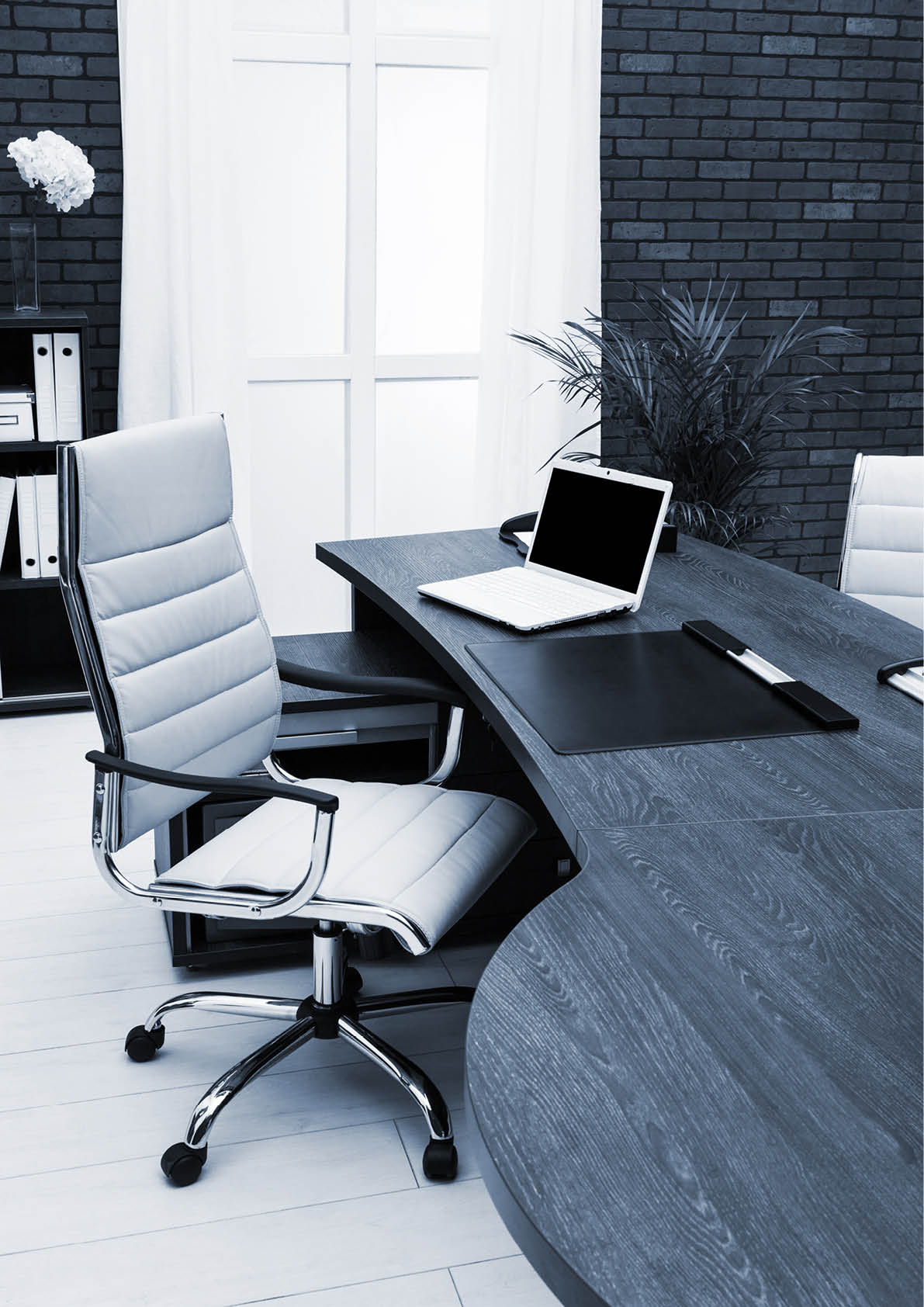 workplace with laptop in modern office