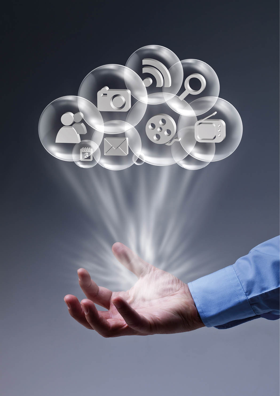 Cloud computing applications at your fingertips - male hand with media bubbles