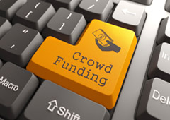 Tecla con el texto crowfunding