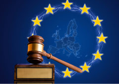 Una maza y en el fondo de la imagen el mapa de europa