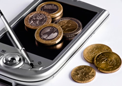 Monedas sobre un móvil