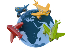 Una bola del mundo y alrededor aviones de distintos colores